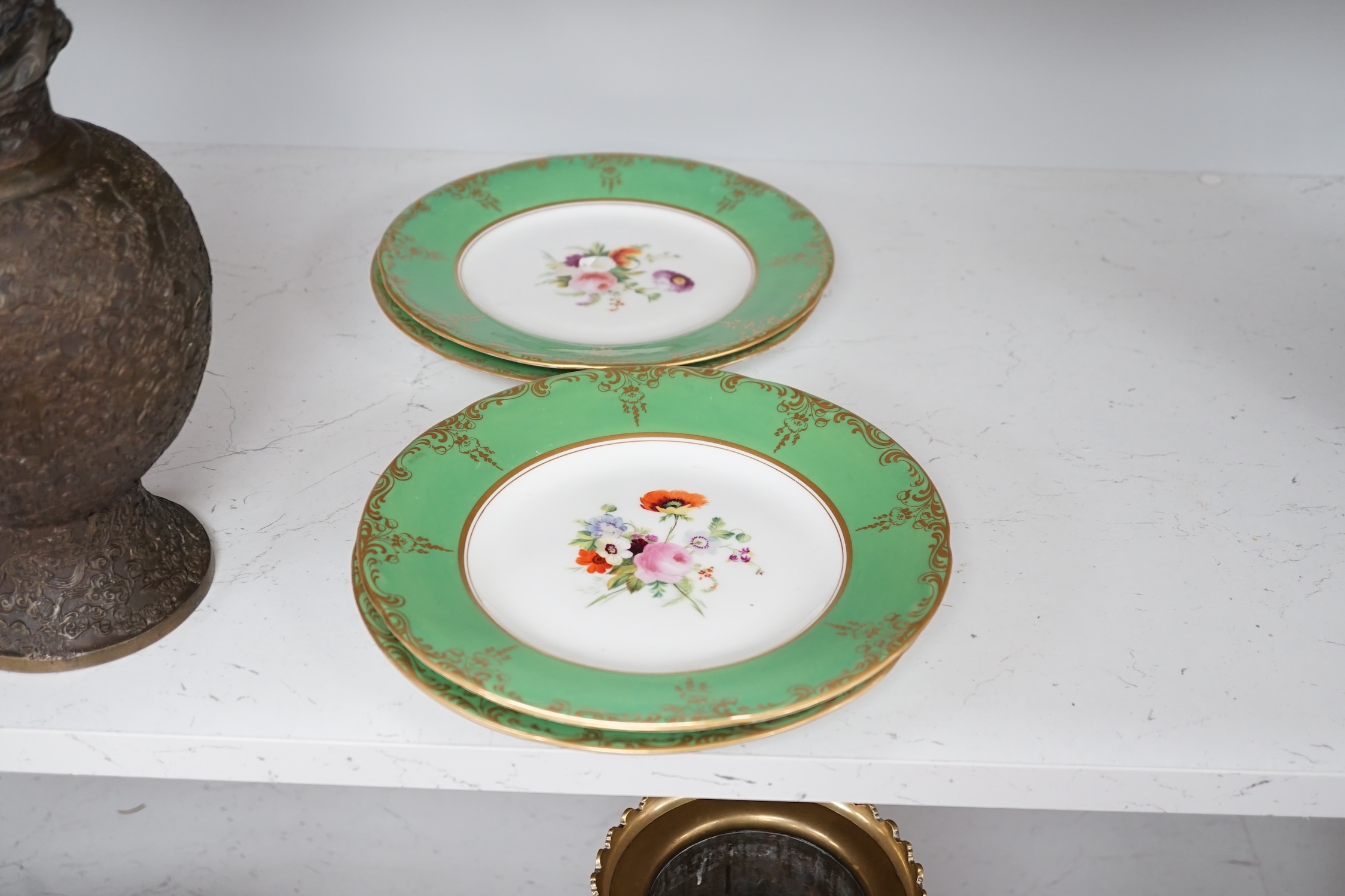 A group of English porcelain green ground dessert plates and dishes, largest 24cm diameter. Condition - fair